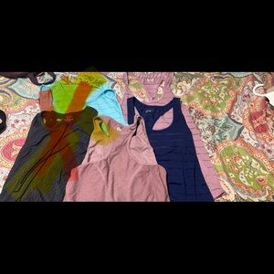 6 Stylish Women's Racerback Tank Tops - Purple and red ones are large